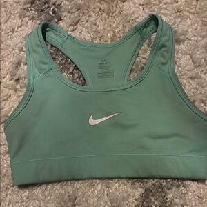 Nike Green Sports Bra with Racerback Design and Medium Support